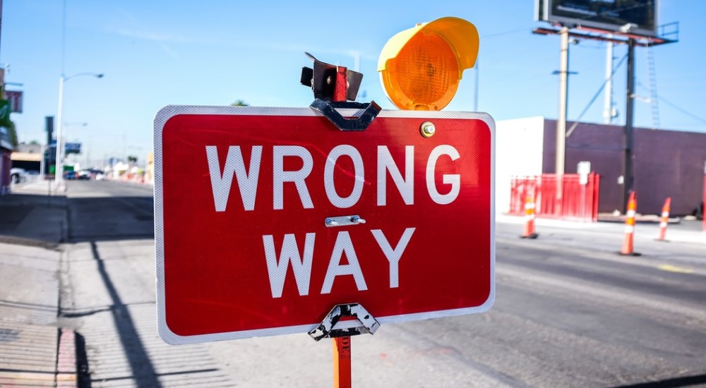 car accident claims - a wrong-way traffic sign
